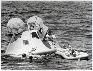 Walter M Prints: Astronauts Leaving Floating Capsule