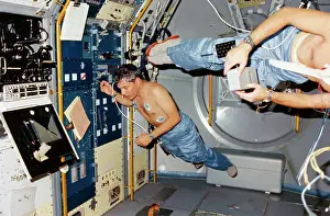 Houston Prints: Astronauts Operating Mechanism in Gravity Free Module