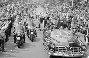 Astronauts Riding in Automobile