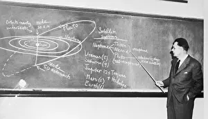 Planetology Prints: Astronomer Gerard P. Kuiper Pointing to Data on Blackboard