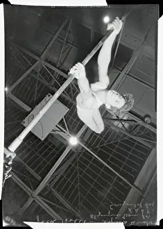 Athlete Practicing Routine on Horizontal Bar