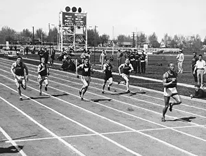 Prints of Track star and Olympian Jesse Owens winning and tying a world record for track Jesse Owens Prints: Athletics - History of 100 Metres World Record - Jesse Owens