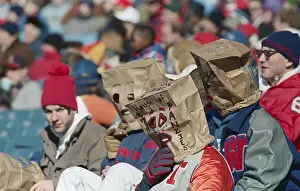 Disappointment Prints: Atlanta Falcons Fans Wearing Bags on Heads
