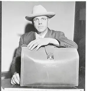 Birmingham Prints: Attorney Silas C. Garrett Standing with His Briefcase