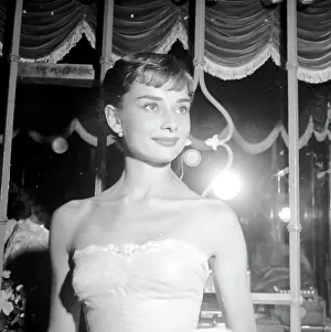 Prints of UNITED STATES - SEPTEMBER 14: September 14, 1953, California, Westwood, Audrey Hepburn, attending the movie benefit premiere of Roman Holiday. (Photo by Earl Leaf/Michael Ochs Archives/Getty Images) Elegance Personified – A Classic Art Print Collection: Audrey Hepburn