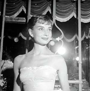 Prints of UNITED STATES - SEPTEMBER 14: September 14, 1953, California, Westwood, Audrey Hepburn, attending the movie benefit premiere of Roman Holiday. (Photo by Earl Leaf/Michael Ochs Archives/Getty Images) Elegance Personified – A Classic Art Print Collection: Audrey Hepburn