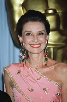 Prints of Actress Audrey Hepburn (1929 - 1993) presents the award for Best Costume Design at the 58th Annual Academy Awards in Los Angeles, 24th March 1986. (Photo by Maureen Donaldson/Getty Images) Elegance Personified – A Classic Art Print Collection: Audrey Hepburn