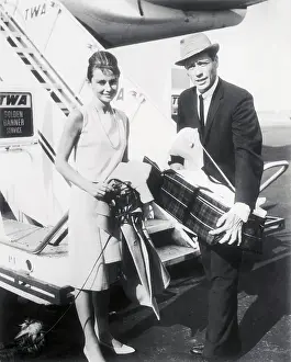 Sean Ferrer Prints: Audrey Hepburn and Family Preparing to Leave on Flight