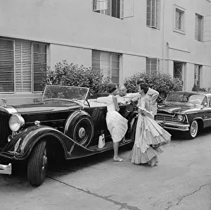 Audrey Hepburn and Jean Simmons at Burl Ives Car