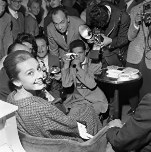 Easy Chair Prints: Audrey Hepburn Laughing at Press Conference
