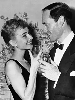 Toast Prints: Audrey Hepburn and Mel Ferrer Having a Drink Together