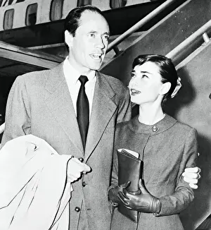 Passenger Airplane Prints: Audrey Hepburn and Mel Ferrer Near Airplane