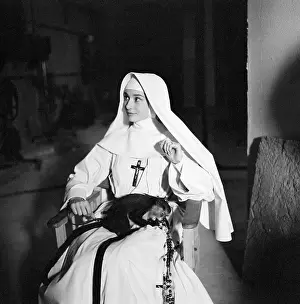 Habit Prints: Audrey Hepburn with a Monkey in The Nun's Story