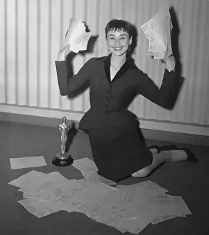 Audrey Hepburn with Oscar and Telegrams