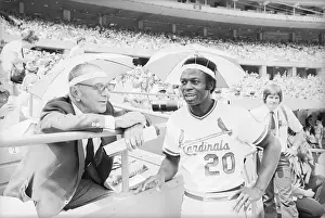 August A. Busch, Jr.and Lou Brock Wearing Umbrella Hats