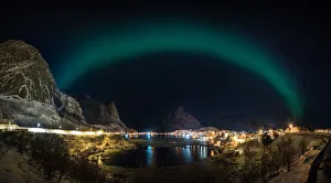 Fishing Village Collection: The aurora belt over Lofoten fishing village, Norway