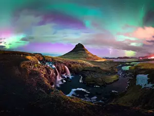 Aurora borealis dancing above the signature mountain snaefellnes kirkjufell in winter