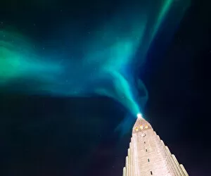 Images Dated 24th December 2017: aurora borealis display over famous Hallgrimskirkja church, reykjavik, Iceland