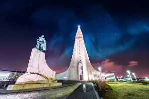 Images Dated 24th December 2017: aurora borealis display over famous Hallgrimskirkja church, reykjavik, Iceland
