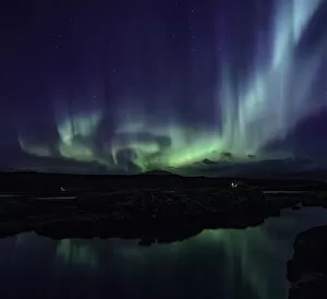Aurora Borealis Collection: Aurora over the Silfra Rift in Iceland