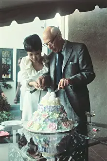 Author Henry Miller and Hoki Tokuda Cutting Wedding Cake