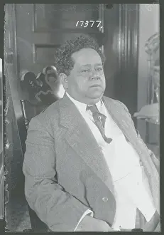 Intelligence Prints: Author Querido Moheno Wearing Suit