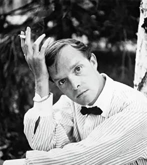 Author Truman Capote Posing Outdoors with Cigarette