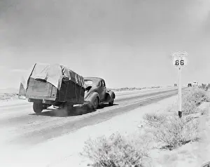 Automobile Pulling Trailer on Route 66