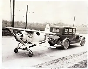 Towing Prints: Automobile Towing Small Airplane