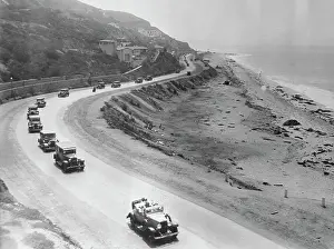 Automobiles Driving Along a Highway