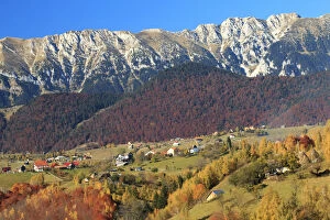 Images Dated 30th October 2015: Autumn landscape of little village and mountain range in background