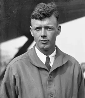 Aviator Charles Lindbergh Posing Next to His Airplane