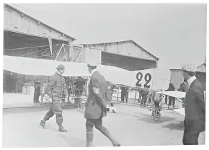 Caution Prints: Aviator Louis Bleriot Checking His Airplane Before Flight