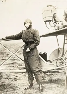Aviatrix Marie Marvingt Posing by Airplane