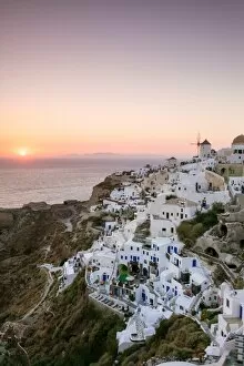 Windmill Gallery: Awesome sunset on town of Oia, Santorini, Greece