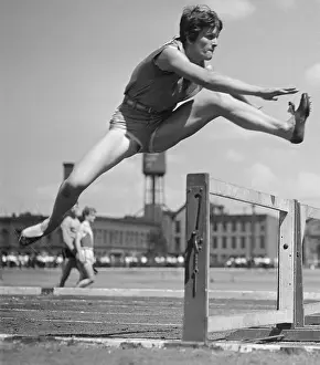 Powerful Prints: Babe Didrickson Jumping over Hurdle