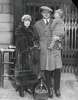 Prints of American baseball player Babe Ruth (1895 - 1948) (born George Herman Ruth Jr) poses at Pennsylvania Station with his wife Helen Ruth (nee Woodford) MLB Legends Art Prints: Top 10 Greatest Baseball Players of All Time: The Babe & Family At Penn Station