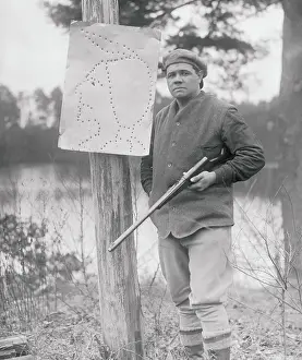Babe Ruth with Rifle and Native American Target