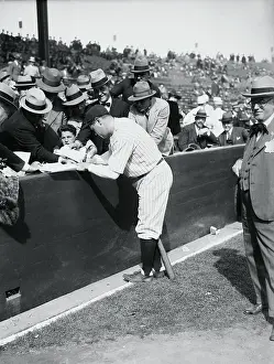 Babe Ruth Signing His Autograph for Fans