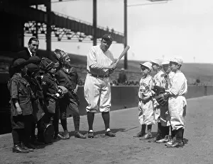 Babe Ruth Teaching Batting Techniques to Boy Rangers