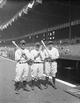 Babe Ruth and Teammates Posing with Baseball Bats