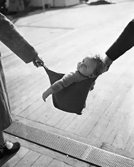 12 23 Months Prints: Baby (12-13 months) carried in baby carrier