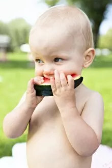 Images Dated 4th August 2014: Baby, 12-14 months, eating watermelon