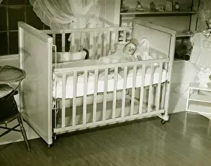 House Interior Prints: Baby (3-6 months) lying in crib, (B&W)