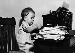Typewriter Prints: Baby boy (2-3 years) typing on typewriter