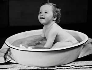 Baby taking bath