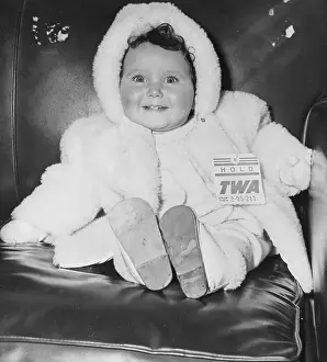Baby Boy Prints: Baby Waiting for Her Parents to Clear Customs