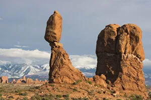 Images Dated 17th April 2016: Balanced Rock in Arches National Park, with snow-covered La Sal mountains in background, Utah, USA
