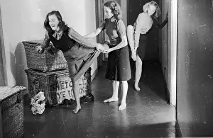Prints of 17th January 1948: A ballet dancing student coaching two other young women in the corridor of a Cecil House The Enchanting Evolution of Ballet: Ballet Class
