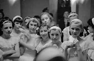 Prints of 8th July 1939: Girls waiting to take various ballet exams at the Royal Academy Of Dancing in London. Original Publication: Picture Post - 173 - Exams For Ballet Dancers - pub The Enchanting Evolution of Ballet: Ballet Exam